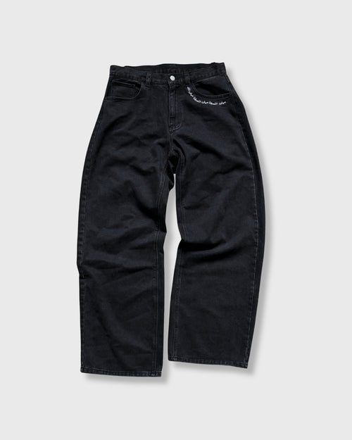Black pants on a light gray background
